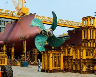 Illustration for article titled Pictures of the World's Biggest Cargo Ship Make You Feel Tiny